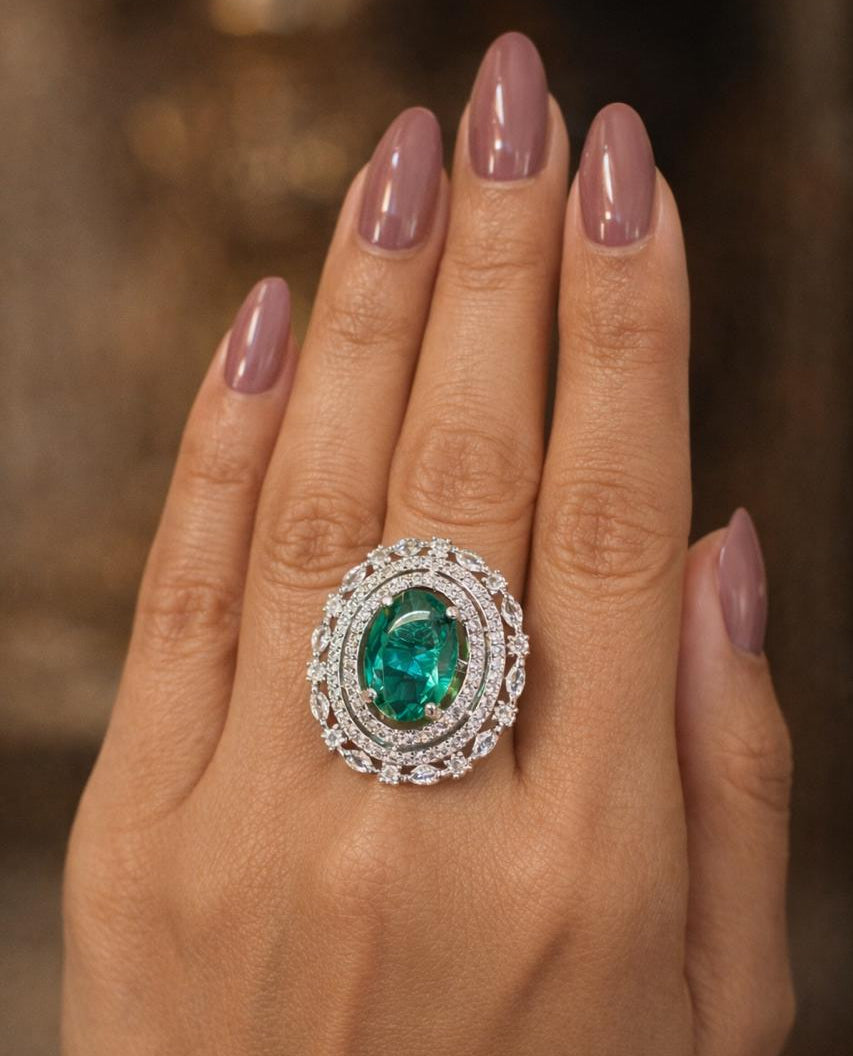 Oval Emerald Diamond Halo Ring